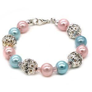 Bracelet with blue and pink beads with lobster clasp.